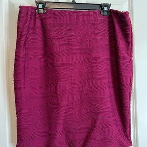 Knee-length wine colored skirt with back slit